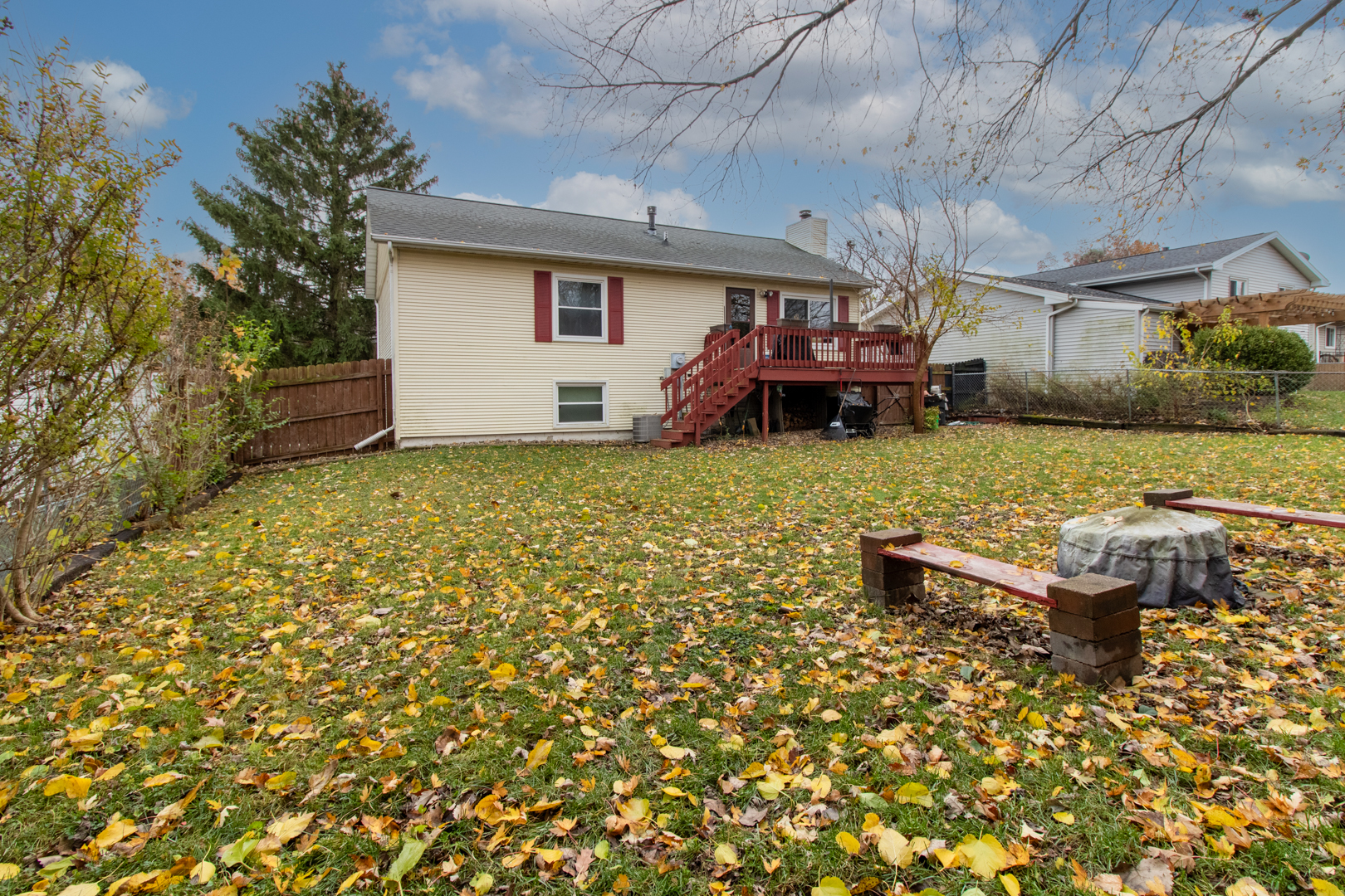 12 Timberview Drive Bloomington, IL 61701 - Photo 35 of 40 a backyard of a house with table and chairs