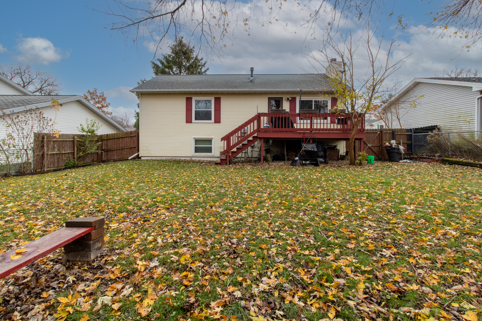 12 Timberview Drive Bloomington, IL 61701 - Photo 36 of 40 a view of a house with backyard porch and sitting area