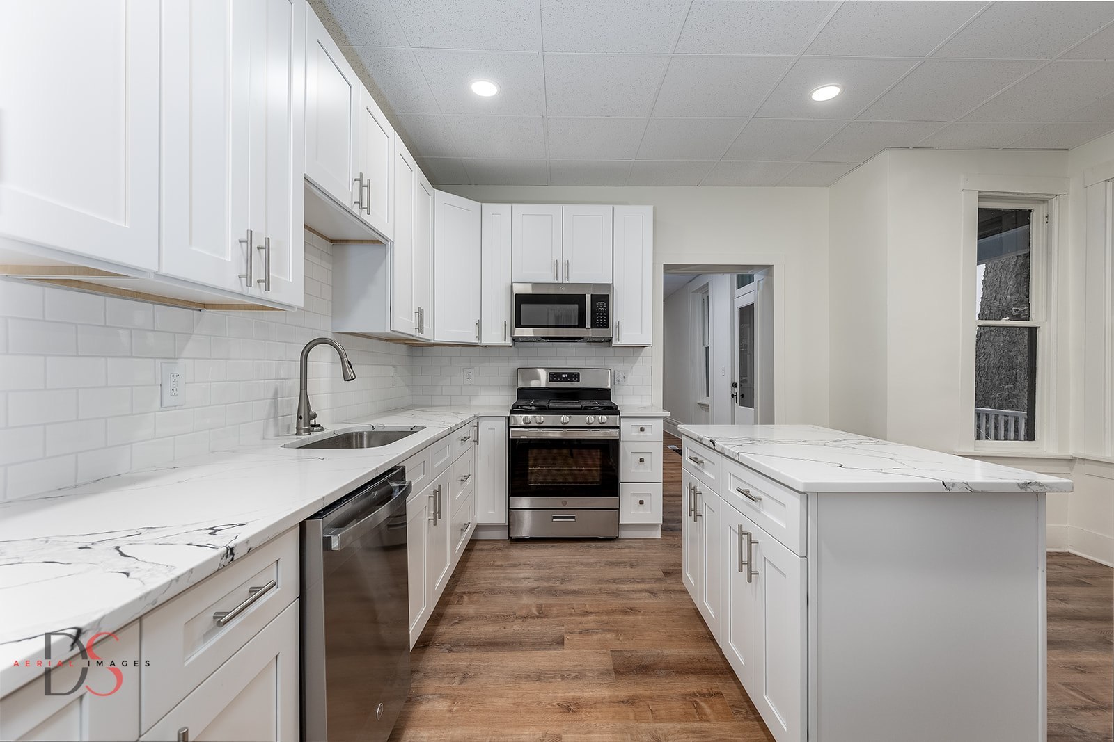 1009 Paul Street Ottawa, IL 61350 - Photo 2 of 18 a kitchen with granite countertop a sink and steel stainless steel appliances