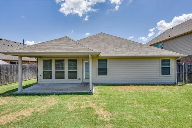 a house view with a garden space