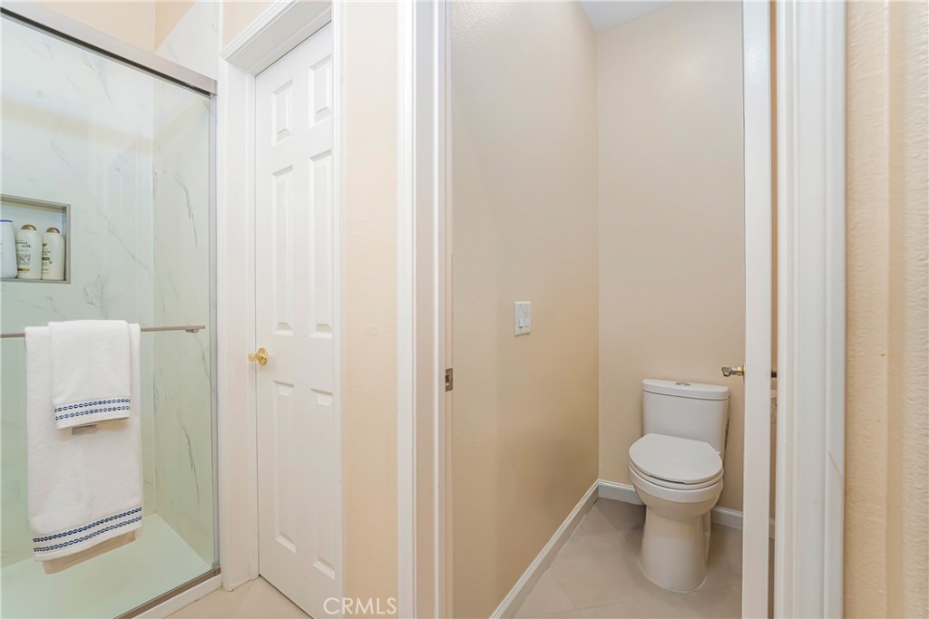 97 Chadron Circle Ladera Ranch, CA 92694 - Photo 24 of 56 Primary en-suite bath with dual sinks and a newer walk-in shower as well as a separate water closet