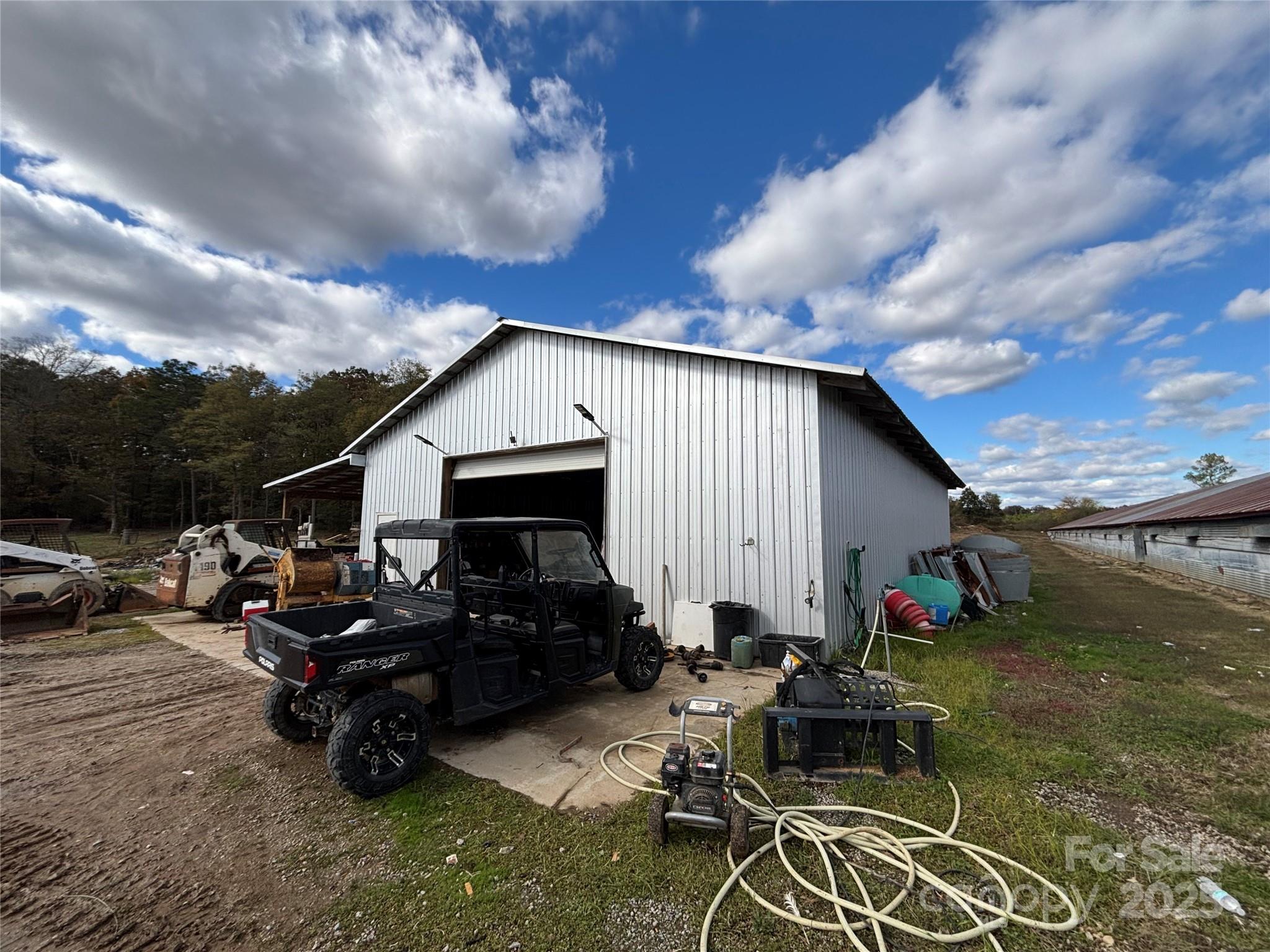 1126 Bunn Road Polkton, NC 28135 - Photo 13 of 14 a backyard of a house with table and chairs