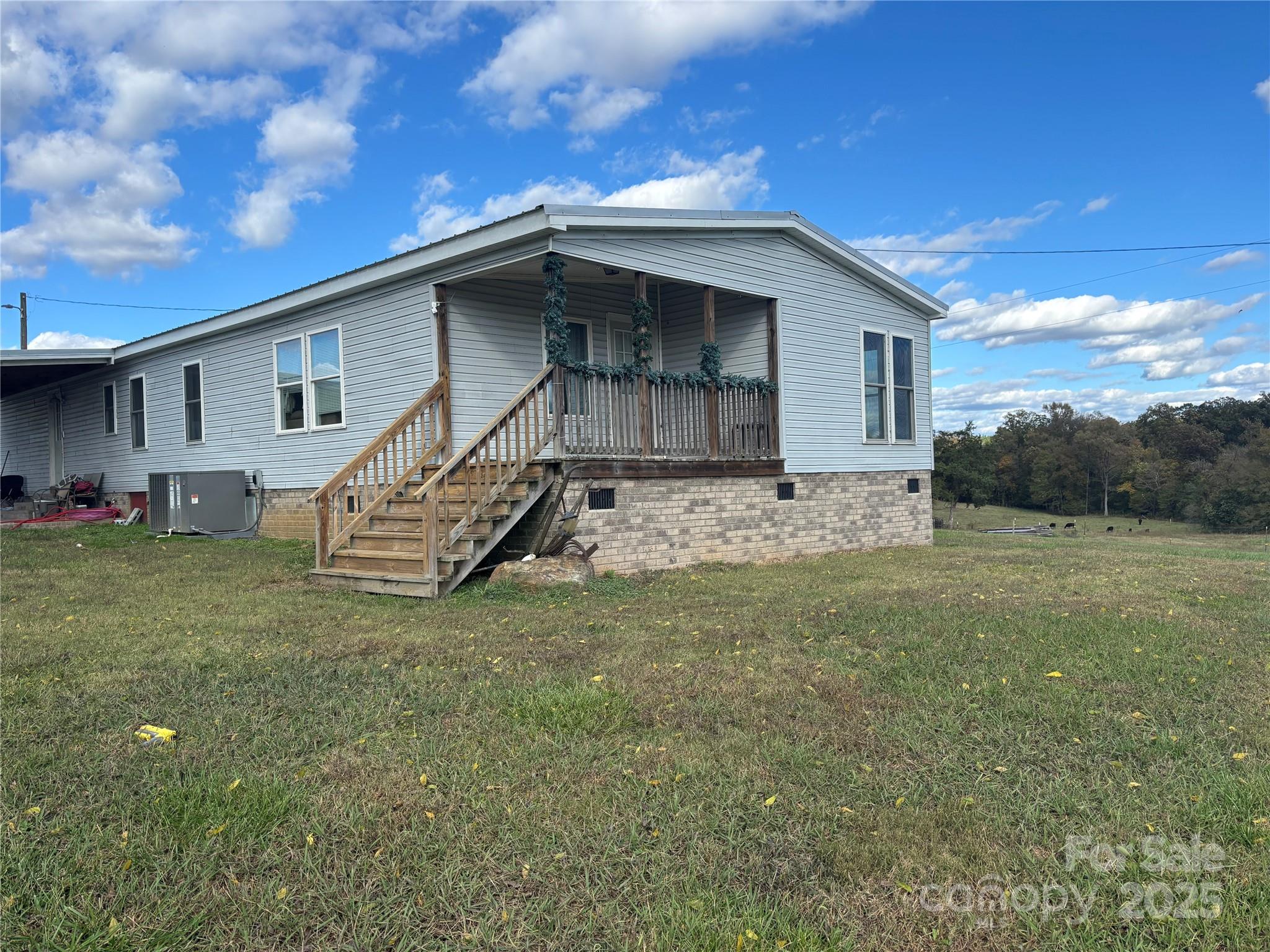 1126 Bunn Road Polkton, NC 28135 - Photo 4 of 14 a view of a house with a yard