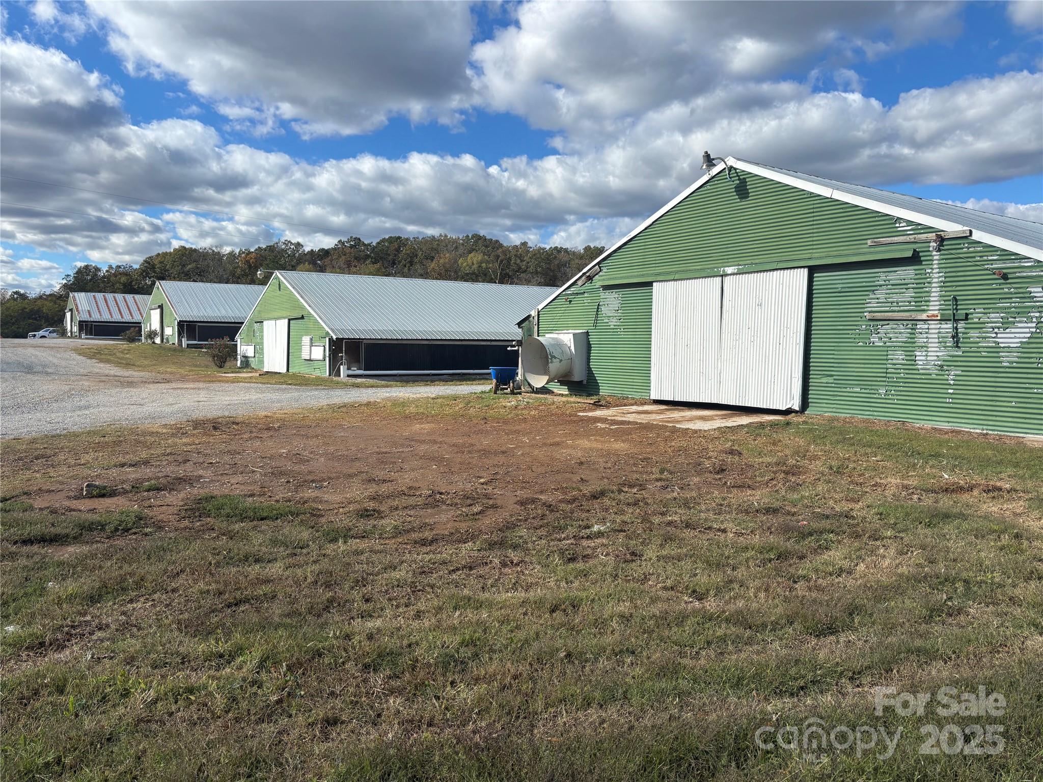 1126 Bunn Road Polkton, NC 28135 - Photo 7 of 14 a view of a house with a yard and garage