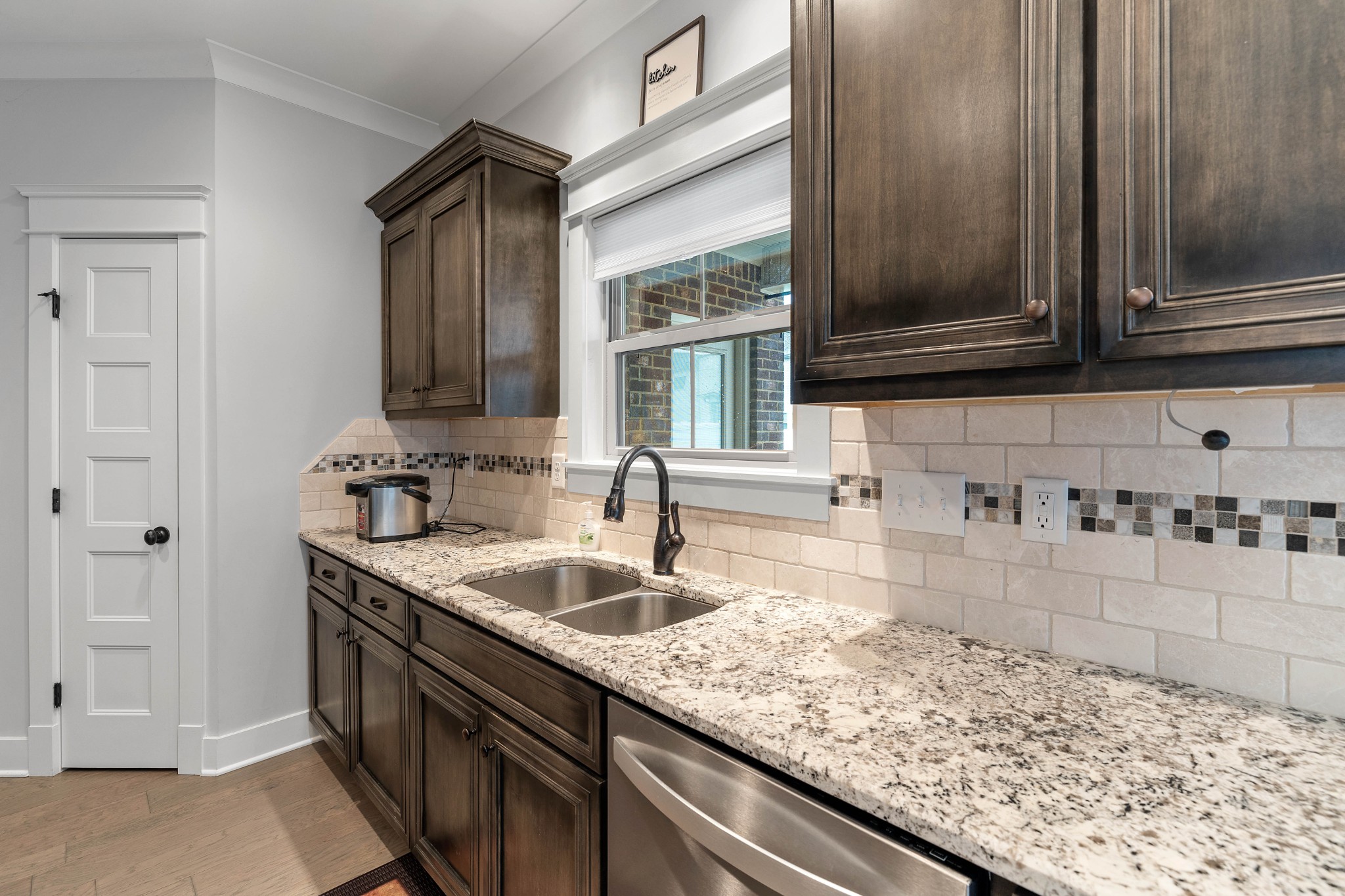 136 Neecee Drive Smyrna, TN 37167 - Photo 12 of 35 a kitchen with granite countertop a sink and a stove