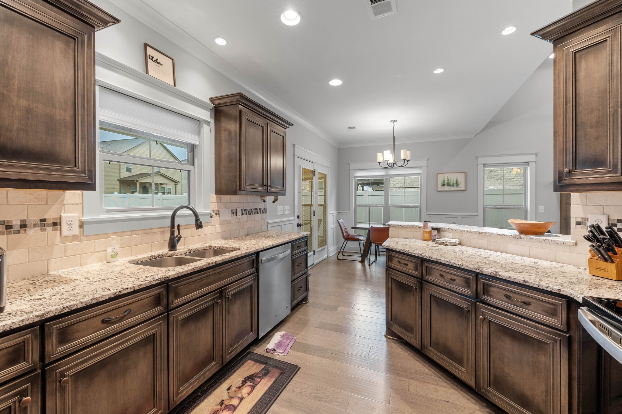 136 Neecee Drive Smyrna, TN 37167 - Photo 13 of 35 a large kitchen with stainless steel appliances granite countertop a sink stove and cabinets