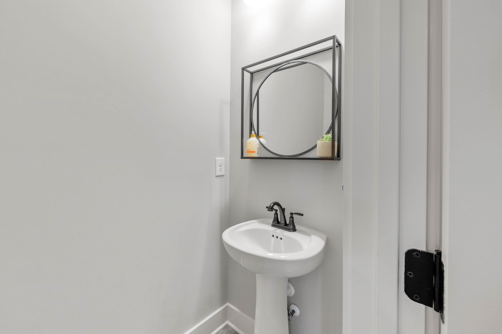 136 Neecee Drive Smyrna, TN 37167 - Photo 16 of 35 a bathroom with a toilet sink and mirror