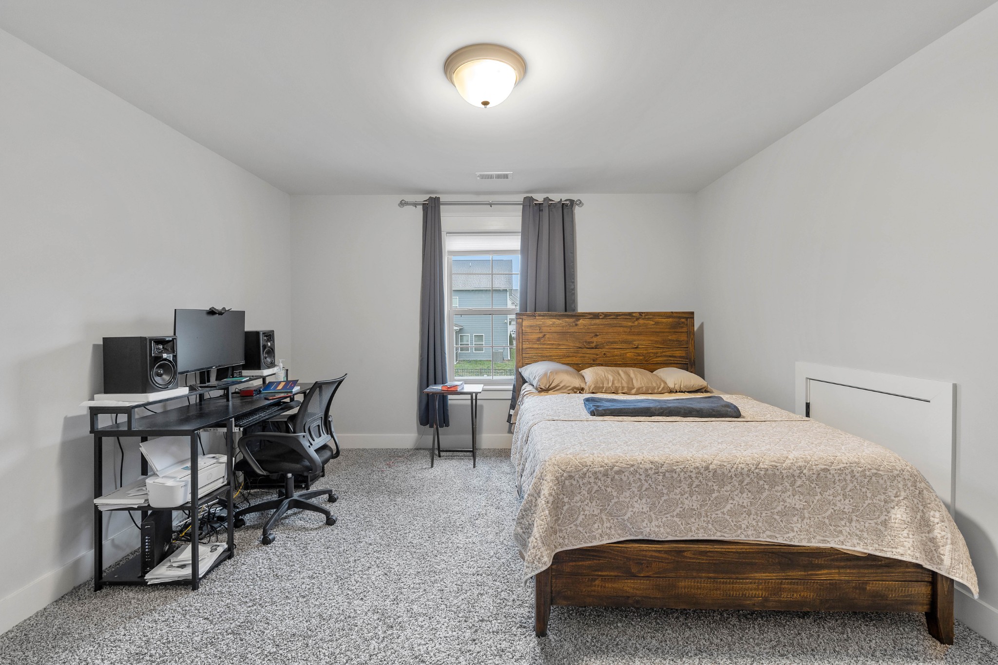 136 Neecee Drive Smyrna, TN 37167 - Photo 24 of 35 a bedroom with a bed and a desk