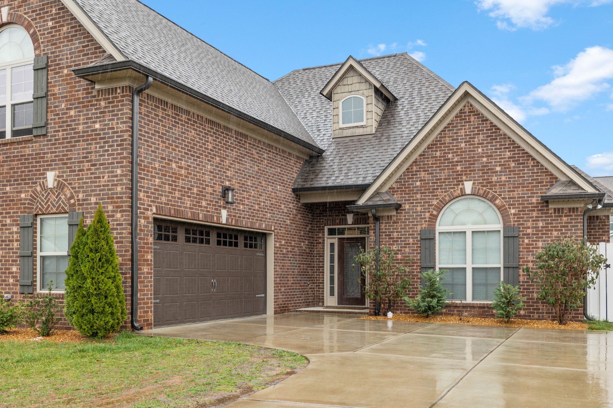 136 Neecee Drive Smyrna, TN 37167 - Photo 3 of 35 a front view of a house with garden