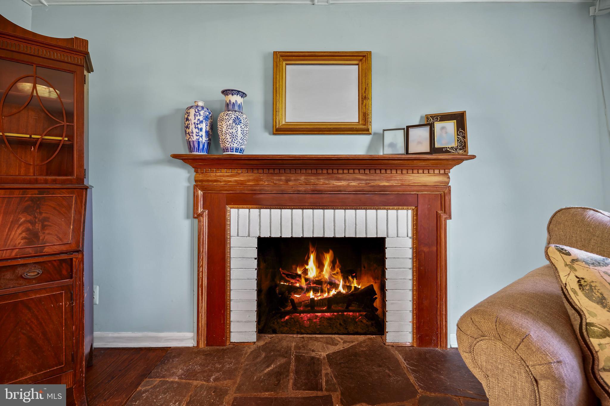 339 Mountain View Road Skillman, NJ 08558 - Photo 11 of 54 a living room with a fireplace and a fireplace