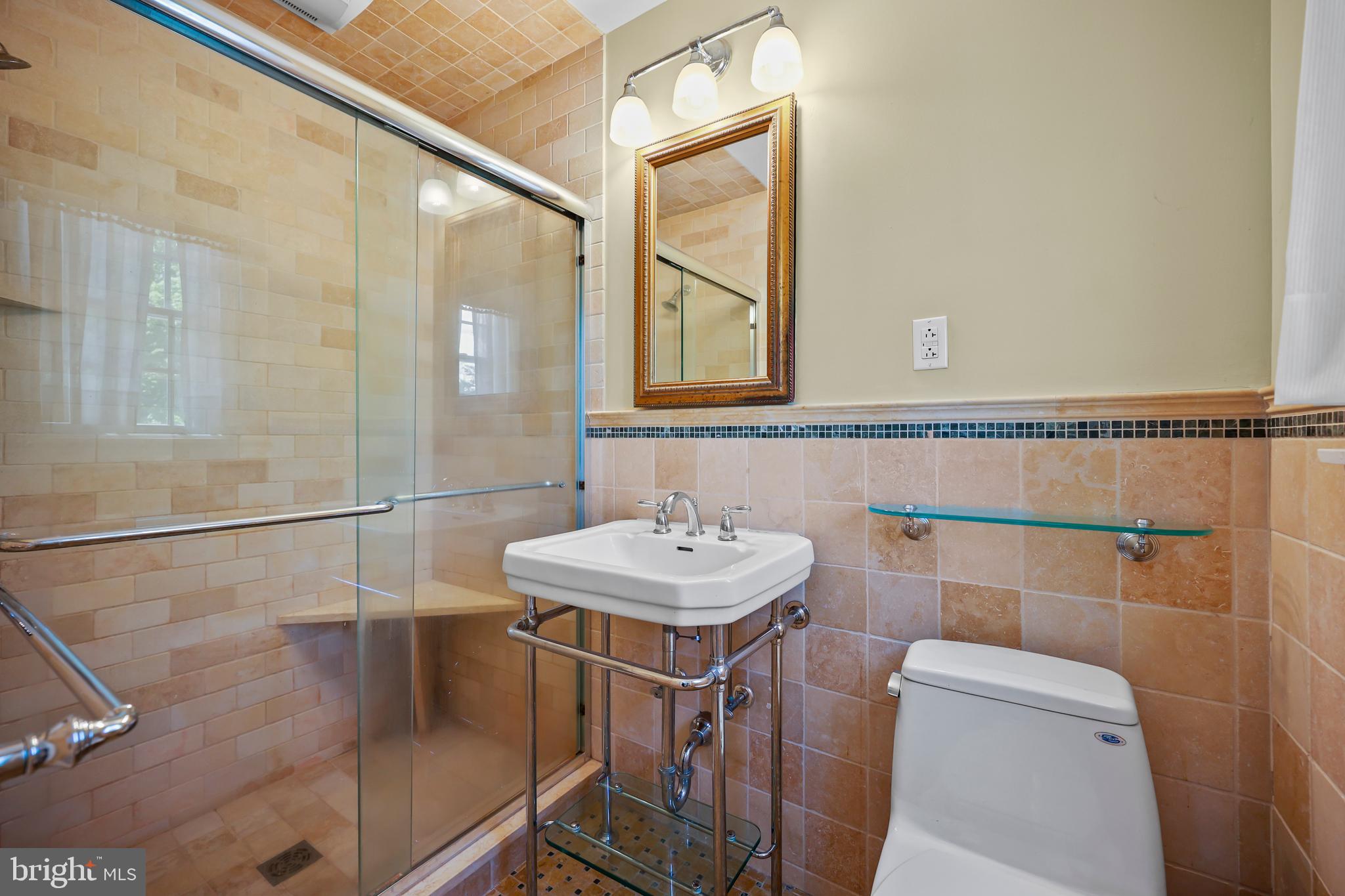 339 Mountain View Road Skillman, NJ 08558 - Photo 29 of 54 a bathroom with a sink a toilet and shower