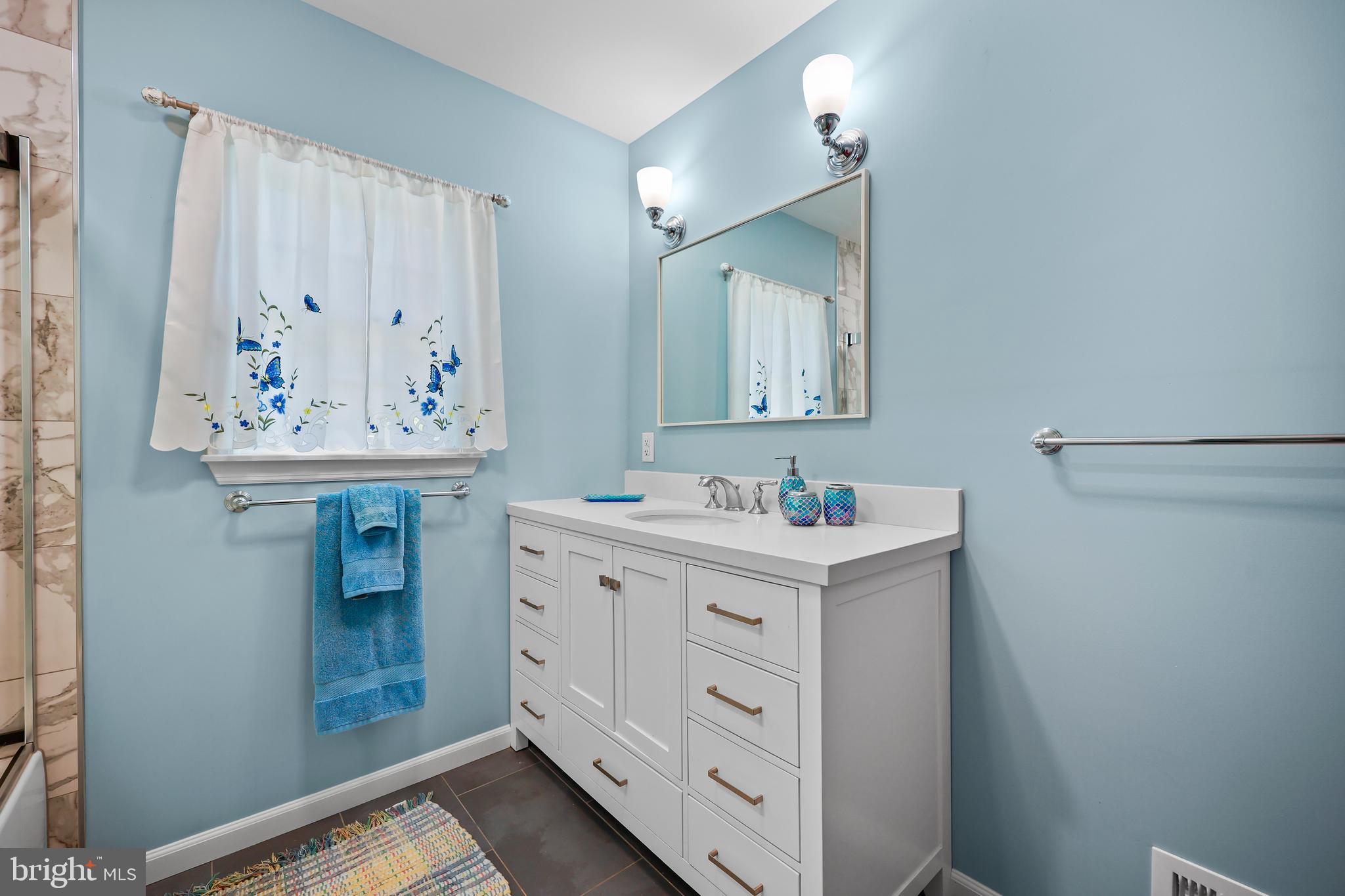 339 Mountain View Road Skillman, NJ 08558 - Photo 33 of 54 a bathroom with a sink and a mirror