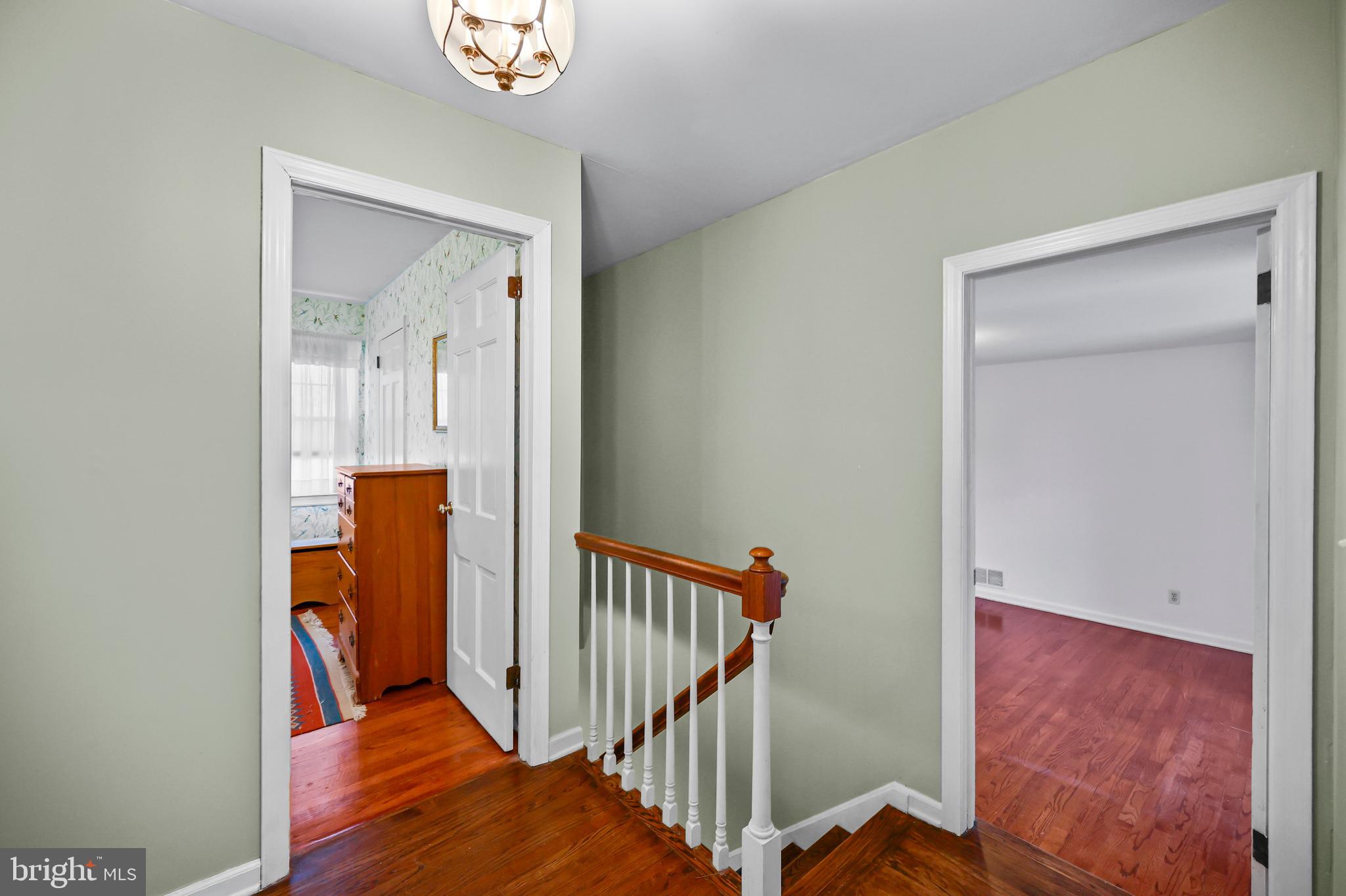 339 Mountain View Road Skillman, NJ 08558 - Photo 34 of 54 a view of a hallway with wooden floor and entryway