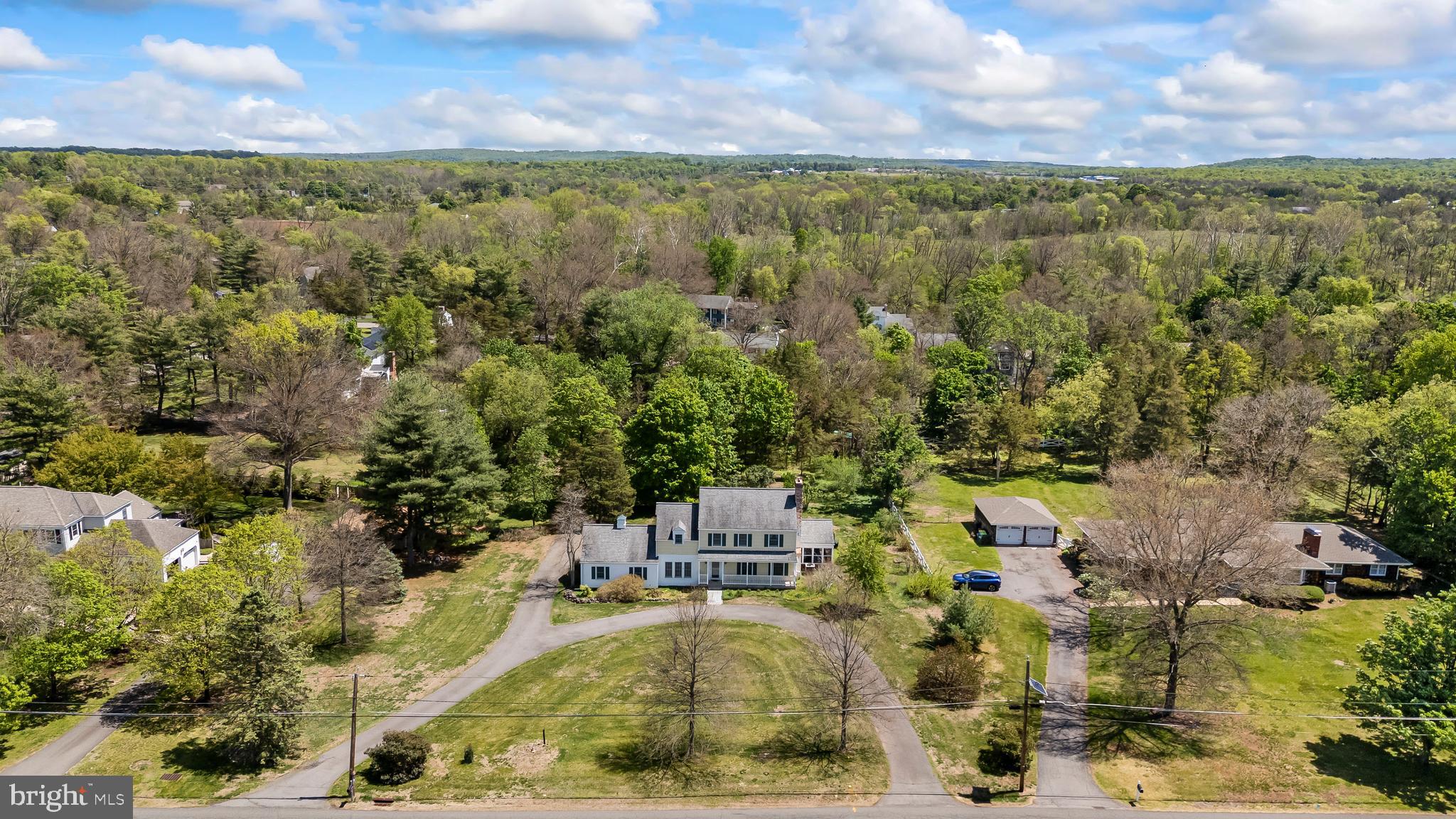 339 Mountain View Road Skillman, NJ 08558 - Photo 47 of 54 a view of a yard with swimming pool and outdoor seating