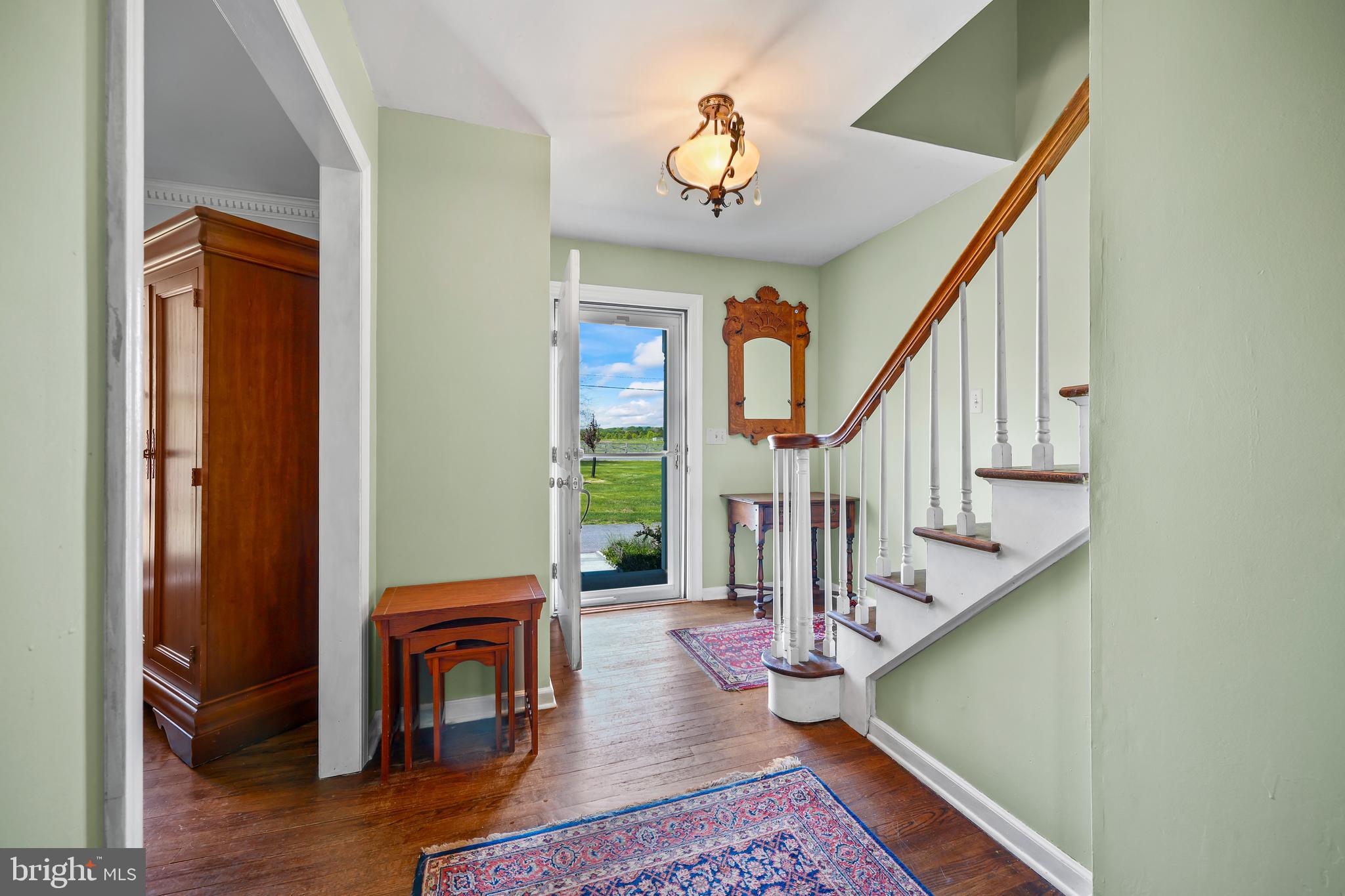 339 Mountain View Road Skillman, NJ 08558 - Photo 5 of 54 a view of entryway and hall with wooden floor