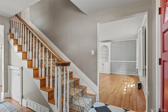 a view of entryway with wooden floor