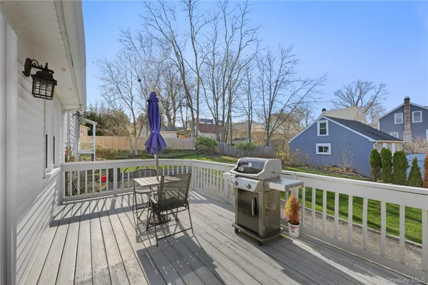 a view of a chairs on the roof deck