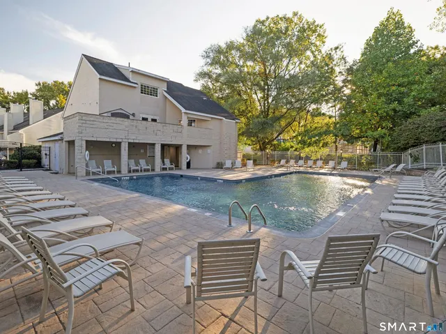 a front view of a house with a lake view