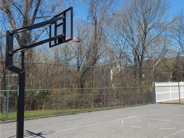 a view of a wrought iron fences in front of house