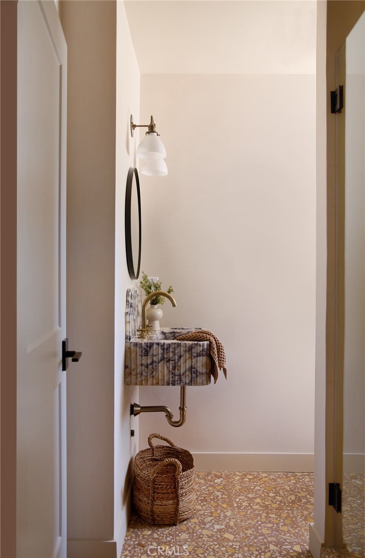 4367 Rising Hill Road Altadena, CA 91001 - Photo 19 of 57 a bathroom with a sink and a mirror