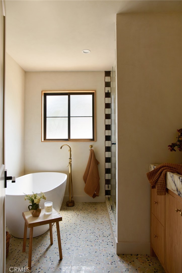 4367 Rising Hill Road Altadena, CA 91001 - Photo 22 of 57 a living room with furniture a window and a potted plant