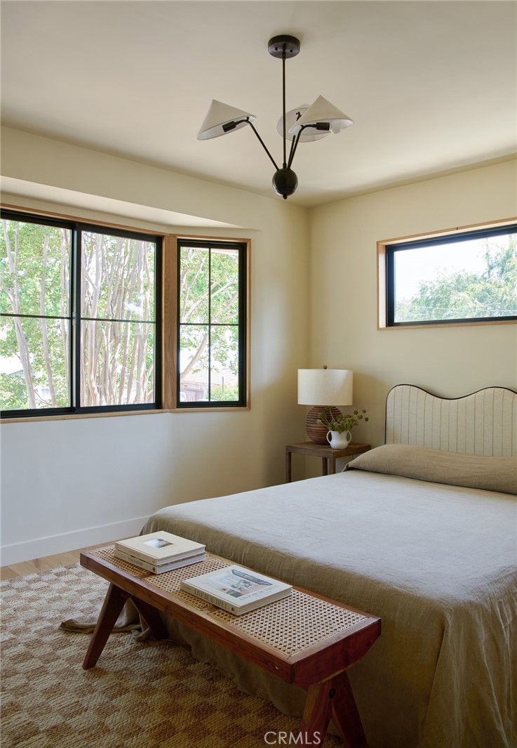 4367 Rising Hill Road Altadena, CA 91001 - Photo 30 of 57 a bedroom with a bed and a table in it