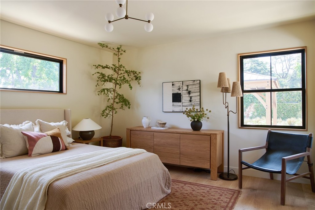 4367 Rising Hill Road Altadena, CA 91001 - Photo 31 of 57 a bedroom with a bed and a window
