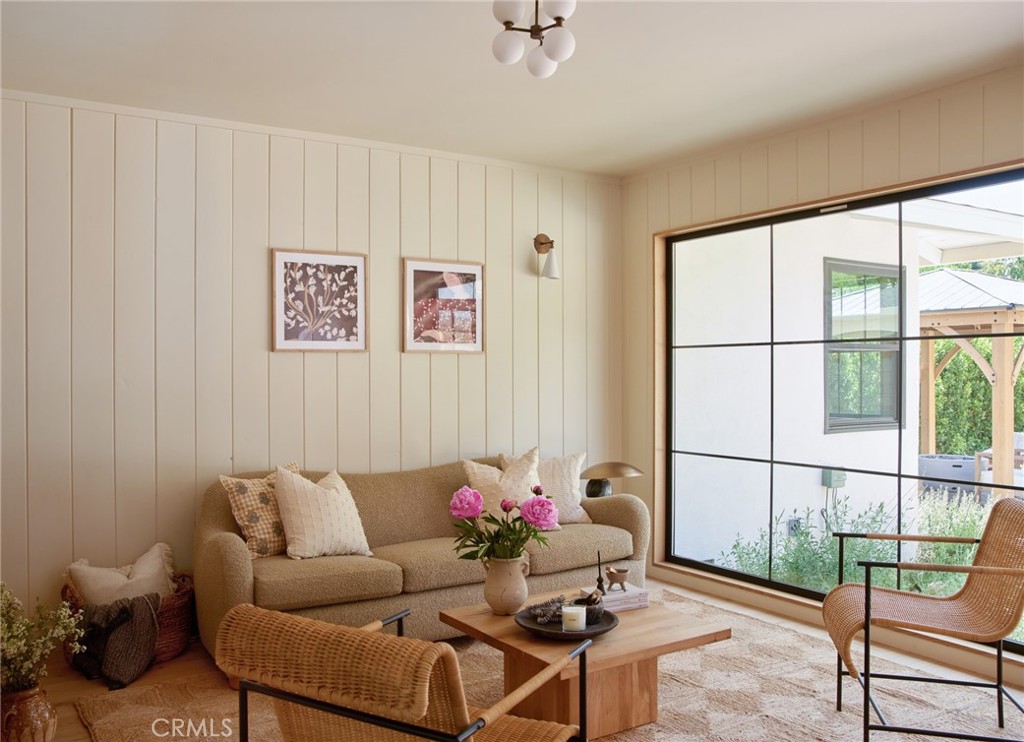 4367 Rising Hill Road Altadena, CA 91001 - Photo 35 of 57 a living room with furniture and a window