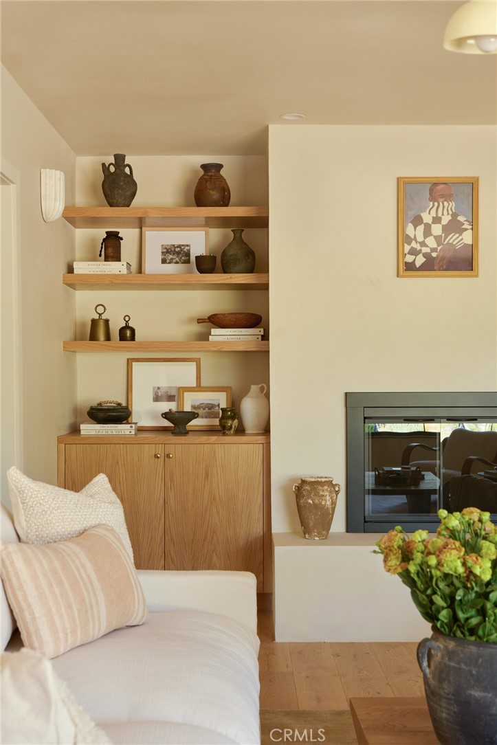 4367 Rising Hill Road Altadena, CA 91001 - Photo 7 of 57 a living room with furniture and flower pot