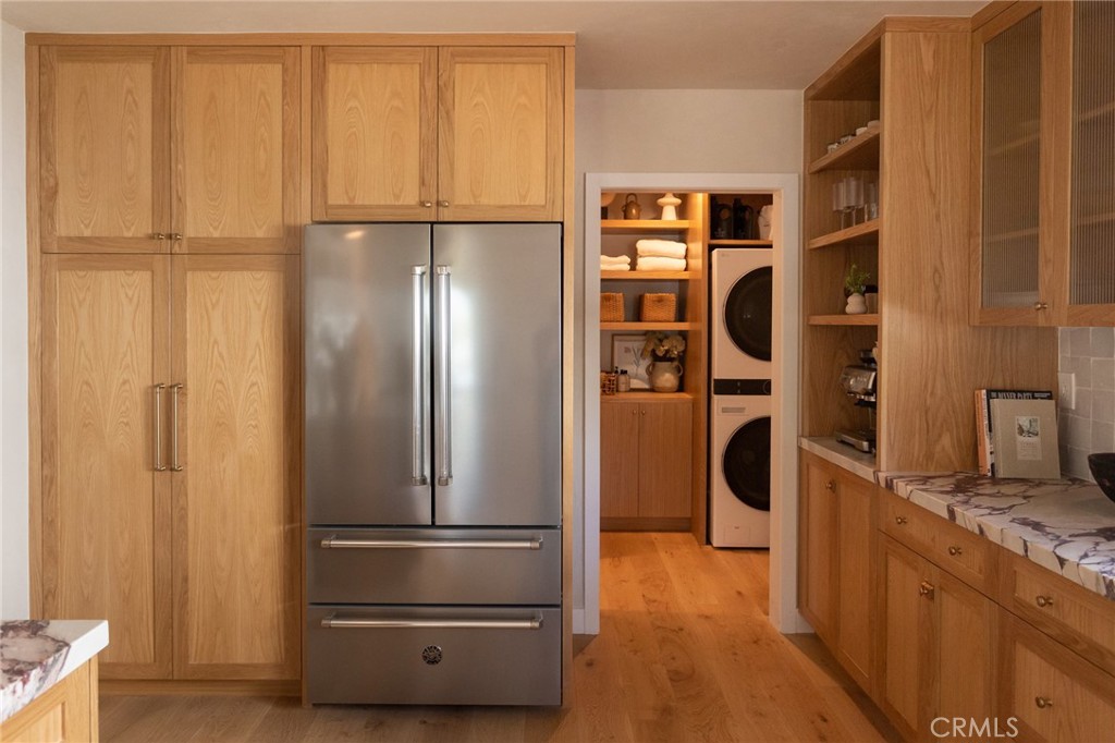 4367 Rising Hill Road Altadena, CA 91001 - Photo 10 of 57 a kitchen with metallic refrigerator freezer and a dishwasher