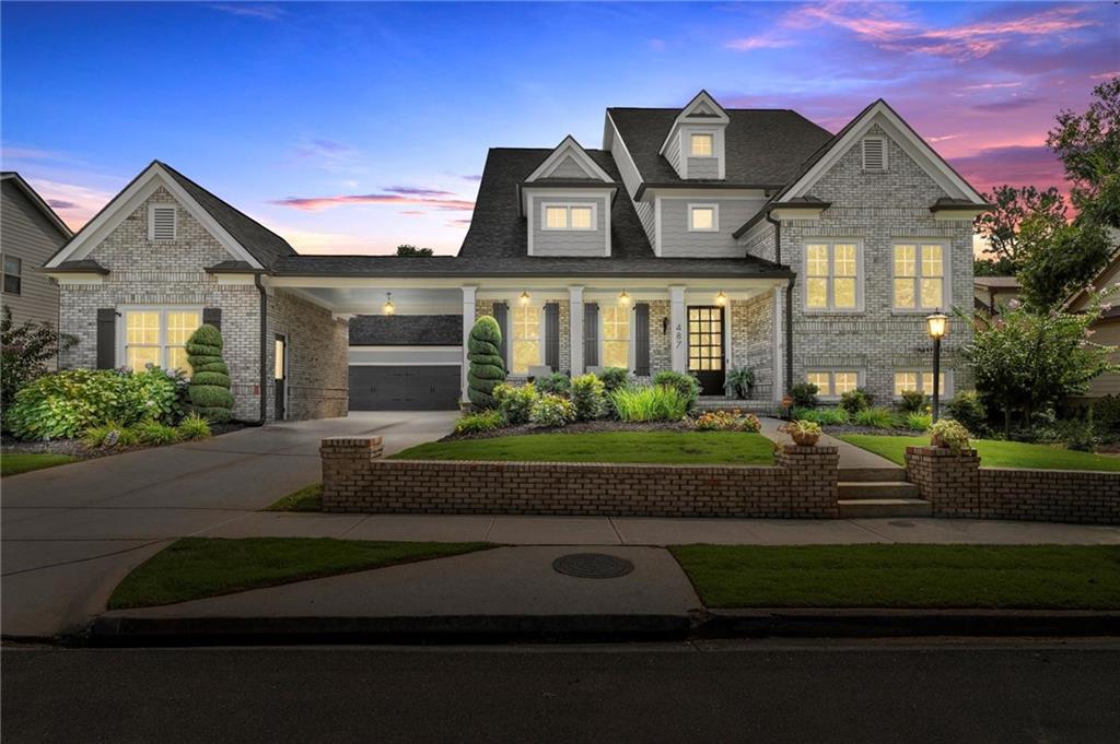 487 Carmichael Circle Canton, GA 30115 - Photo 1 of 65 front view of house with a street