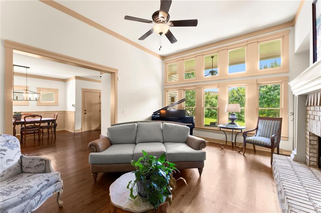 487 Carmichael Circle Canton, GA 30115 - Photo 17 of 65 a living room with furniture and a large window