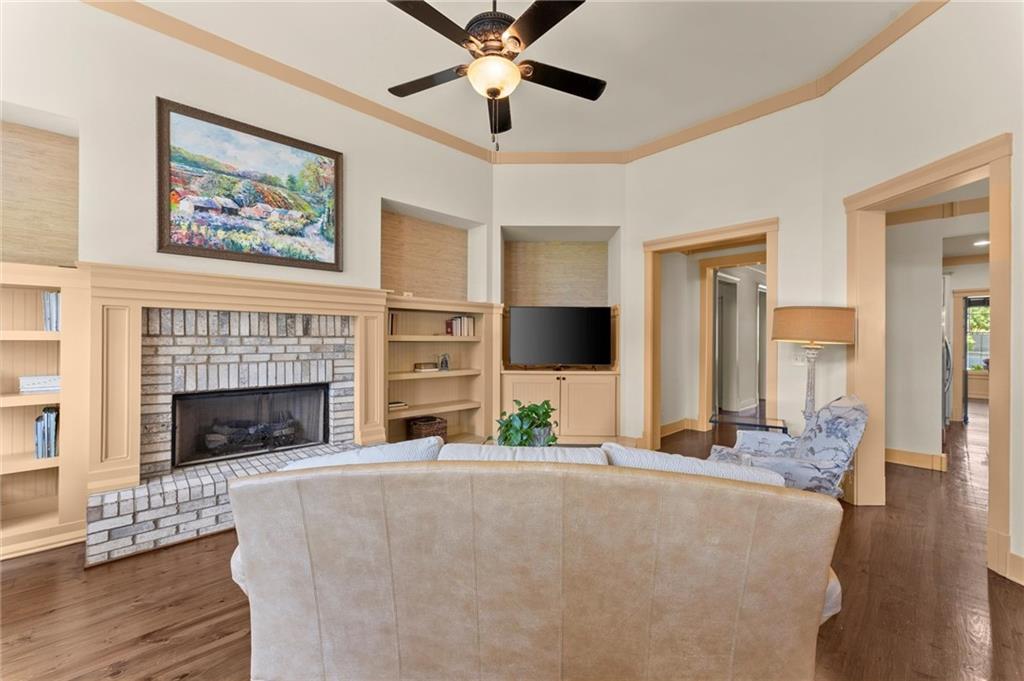 487 Carmichael Circle Canton, GA 30115 - Photo 18 of 65 a living room with furniture and a fireplace