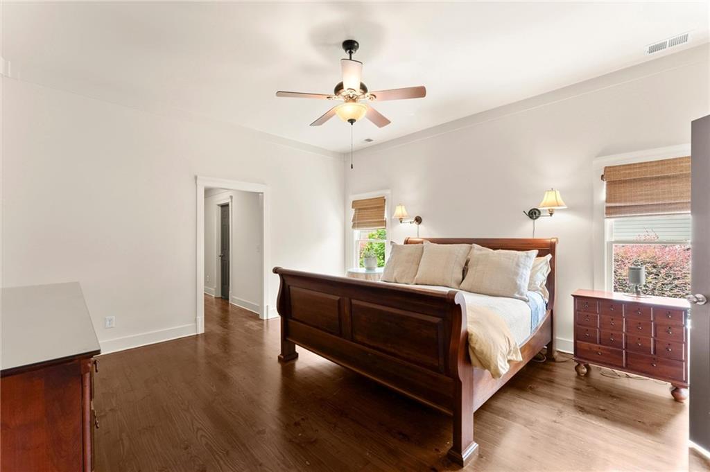 487 Carmichael Circle Canton, GA 30115 - Photo 27 of 65 a bedroom with bed and window