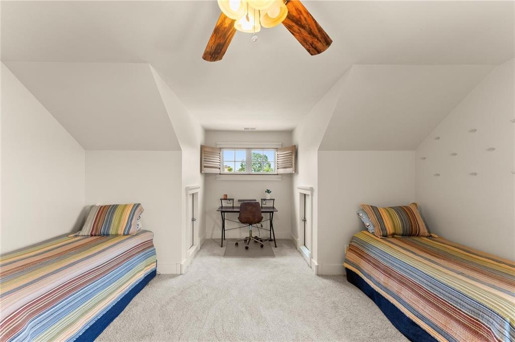 487 Carmichael Circle Canton, GA 30115 - Photo 37 of 65 a bedroom with furniture and a couch