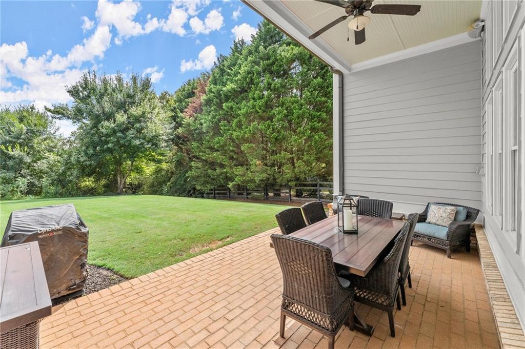 487 Carmichael Circle Canton, GA 30115 - Photo 49 of 65 a view of a patio with a yard