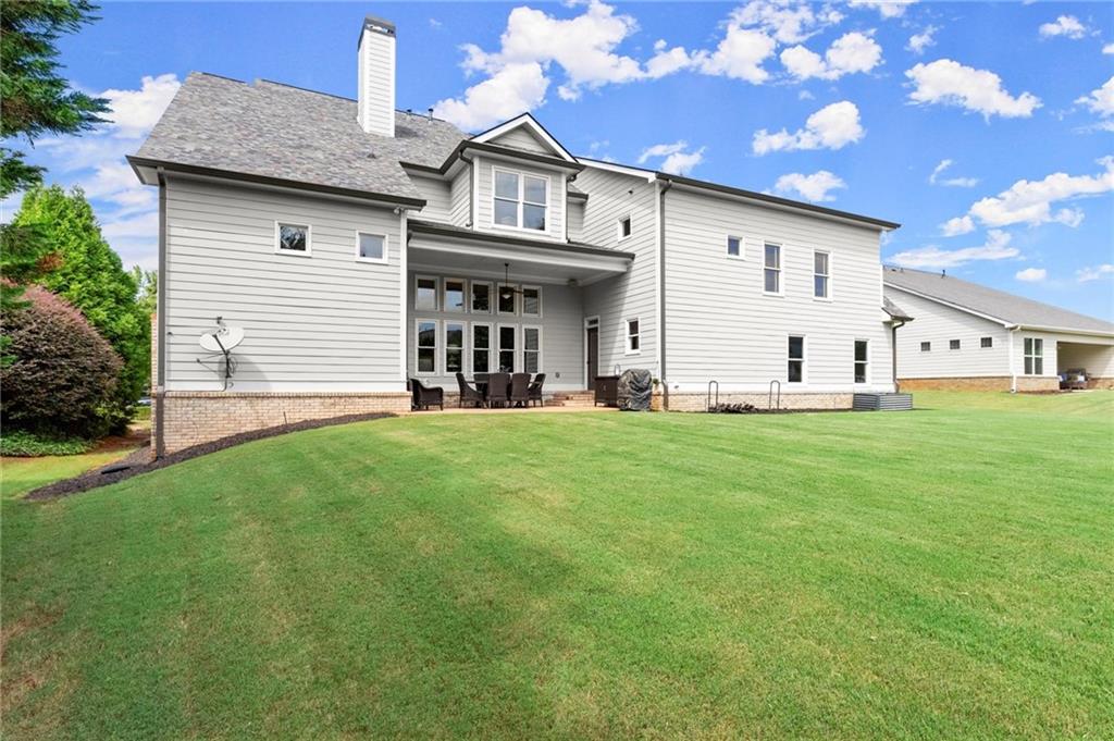 487 Carmichael Circle Canton, GA 30115 - Photo 53 of 65 a view of a house with a yard