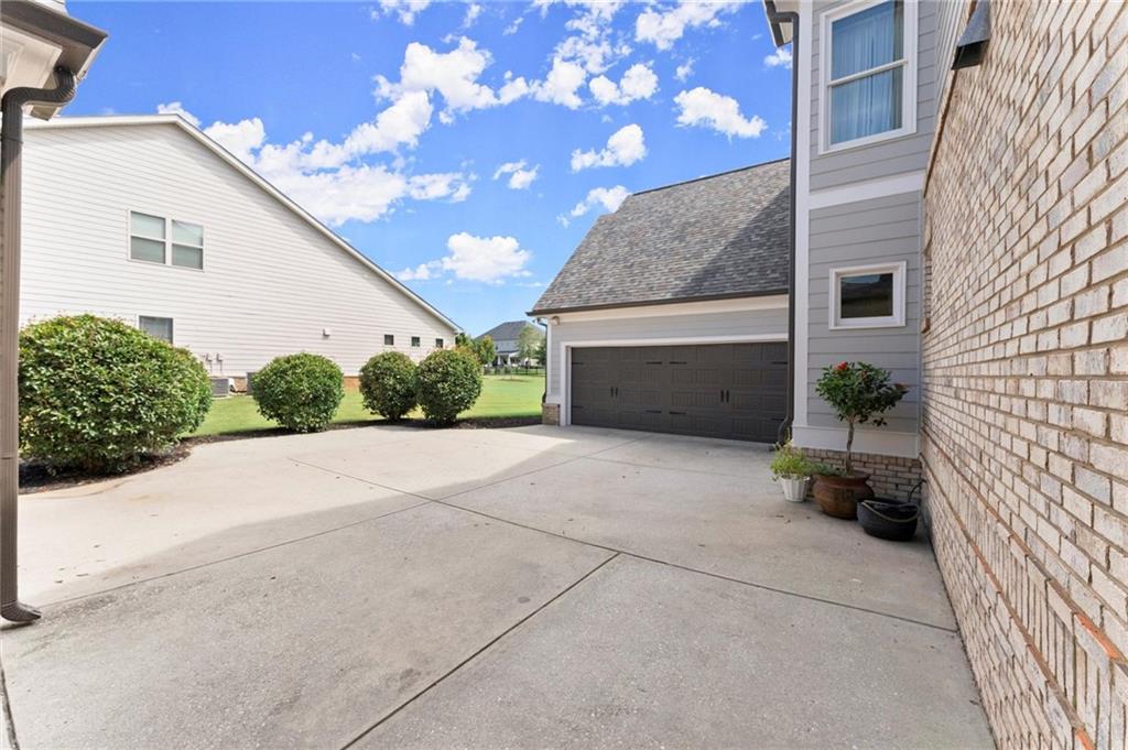 487 Carmichael Circle Canton, GA 30115 - Photo 59 of 65 a house view with a outdoor space