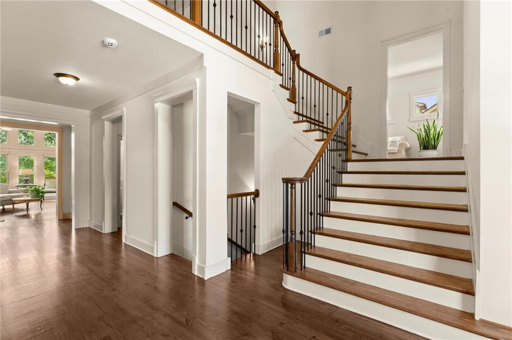 487 Carmichael Circle Canton, GA 30115 - Photo 6 of 65 a view of entryway with wooden floor and stairs