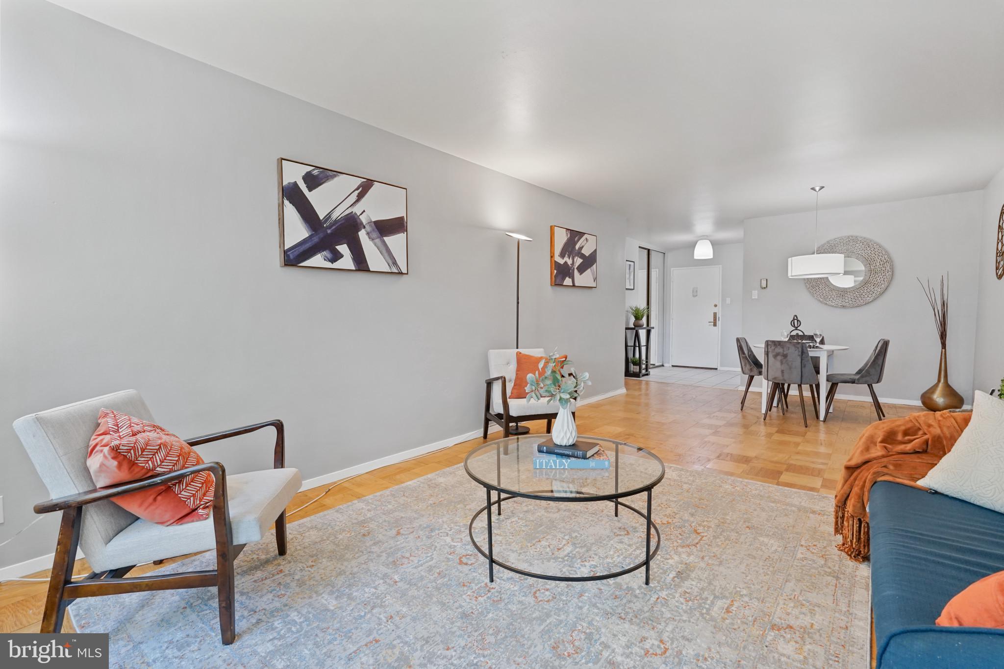 1435 4th Street Southwest, Unit B107 Washington, DC 20024 - Photo 4 of 42 a living room with furniture and white walls
