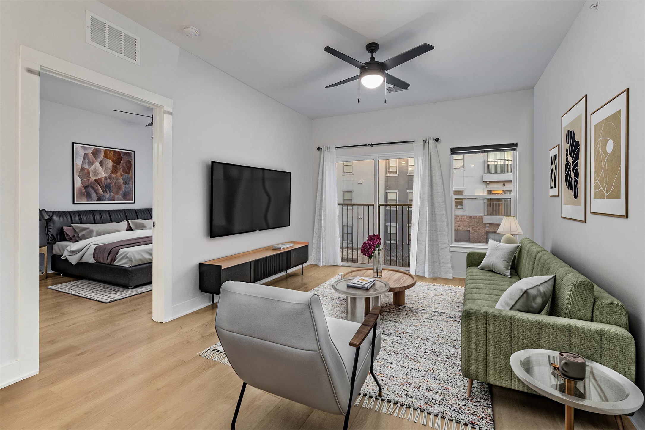 2500 Longview Street, Unit 418 Austin, TX 78705 - Photo 10 of 40 Living area featuring light wood-style flooring and a ceiling fan
