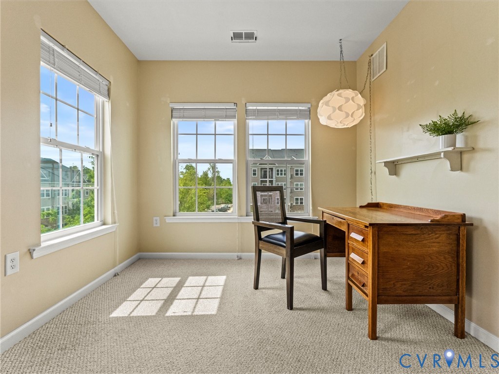 14000 Briars Circle, Unit 304 Midlothian, VA 23114 - Photo 20 of 27 a room with furniture and a window