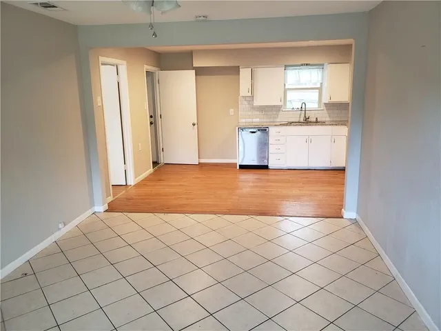 a view of a kitchen and window