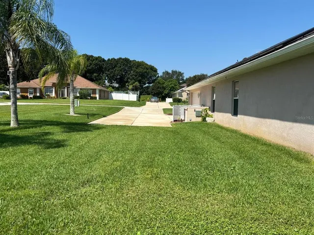 a house view with a garden space