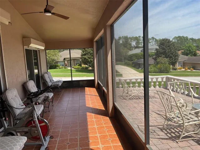 a view of a glass door with a balcony