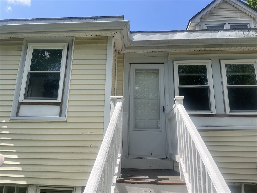 21 Arbor Lane, Unit 21 Dedham, MA 02026 - Photo 2 of 10 a view of a house with entryway and front door