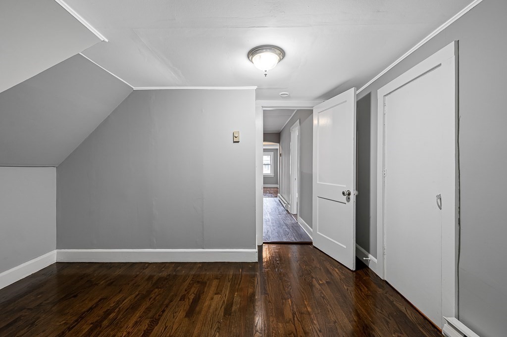 50 Ruggles Street, Unit 3 Franklin, MA 02038 - Photo 12 of 17 a view of an empty room with wooden floor