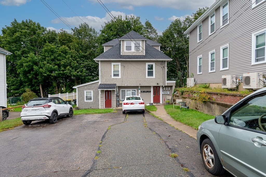 50 Ruggles Street, Unit 3 Franklin, MA 02038 - Photo 14 of 17 a car parked in front of a house