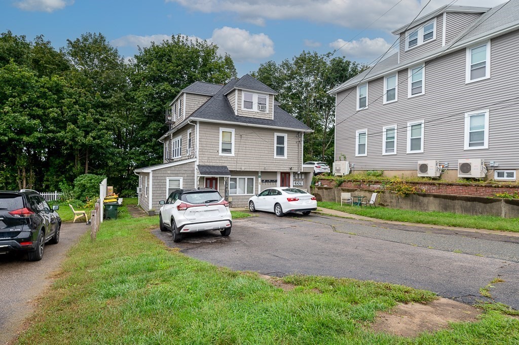 50 Ruggles Street, Unit 3 Franklin, MA 02038 - Photo 15 of 17 a car parked in front of a house