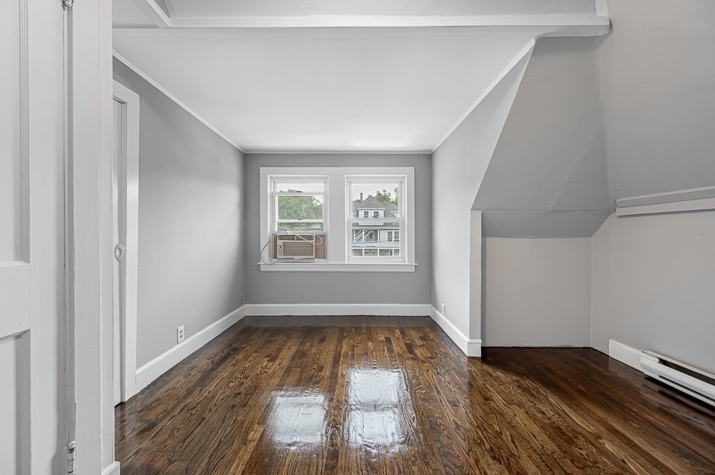 50 Ruggles Street, Unit 3 Franklin, MA 02038 - Photo 2 of 17 a view of empty room with wooden floor